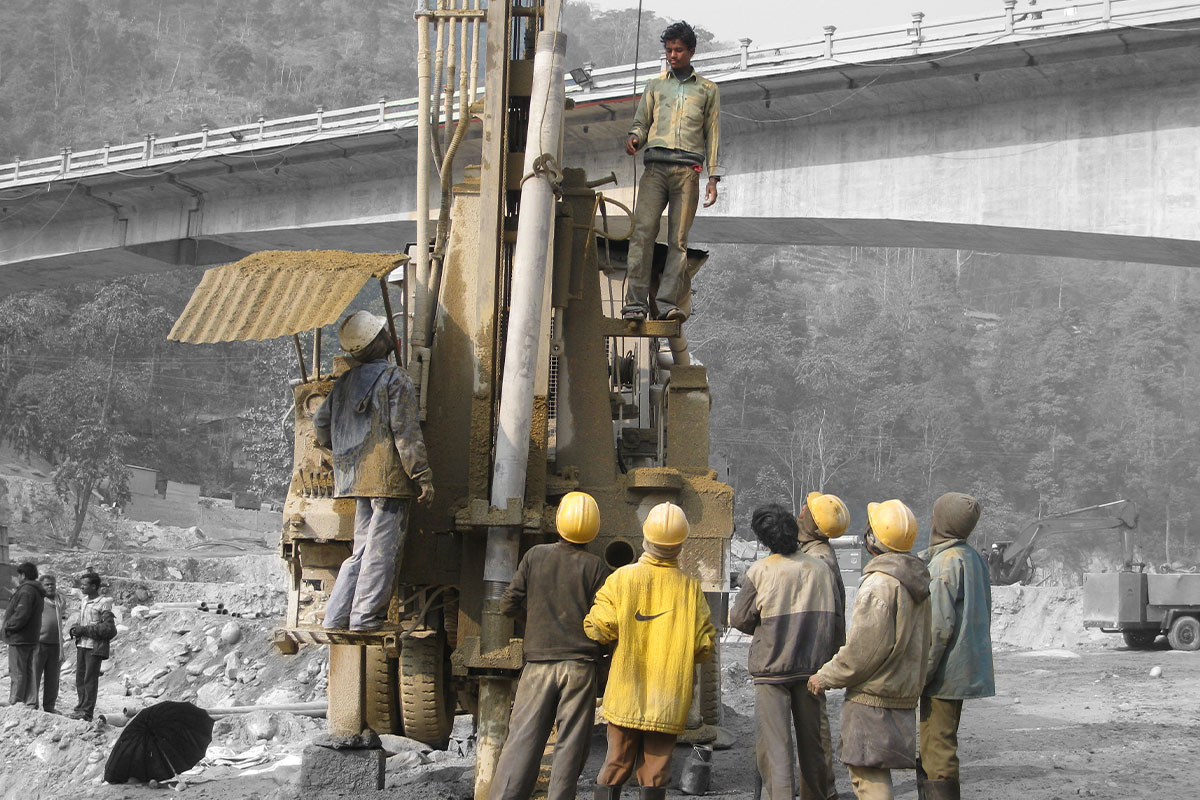 A team preparing to dig on a contruction site.